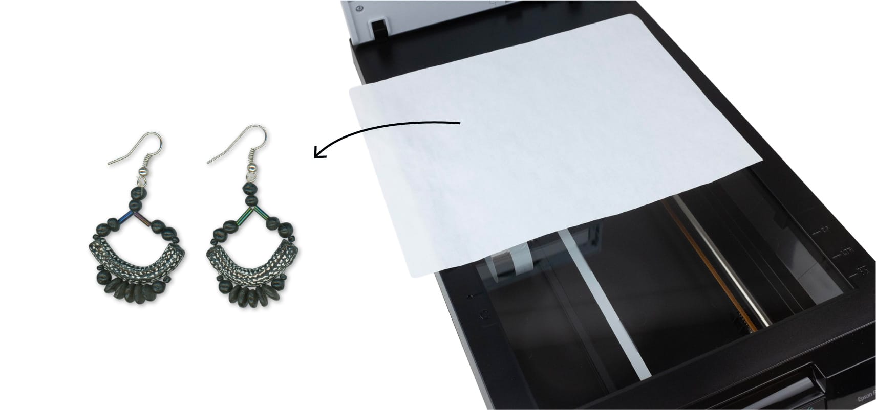 Paper placed on earrings on scanner bed and final image result